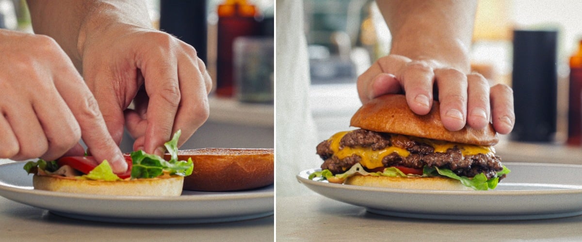 Samenstellen en serveren van een afgewerkte cannabisburger met gesmolten cheddar, sla, tomaat en een geïnfuseerd broodje